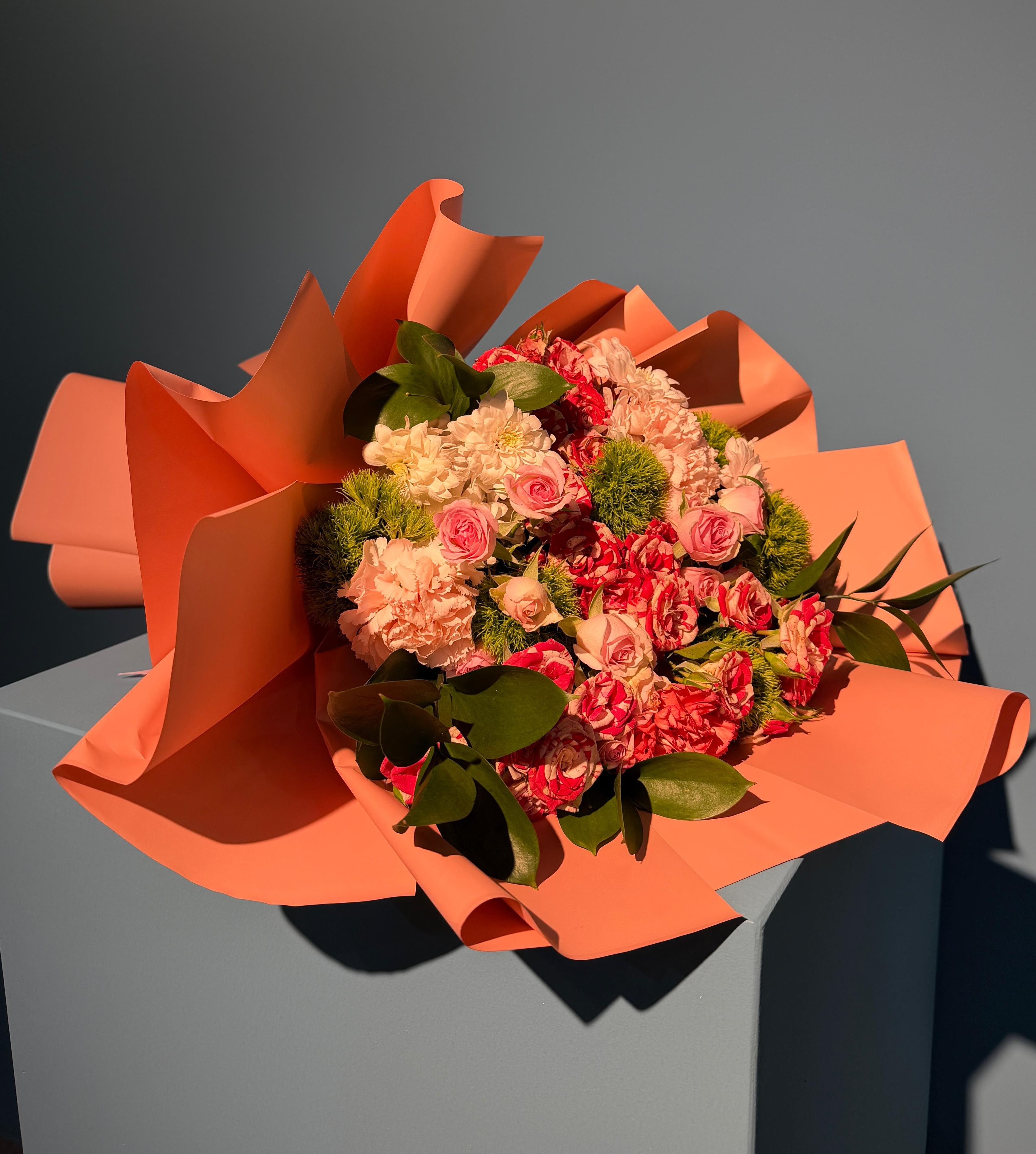 Gentle Kiss soft pink bouquet with baby roses and carnations