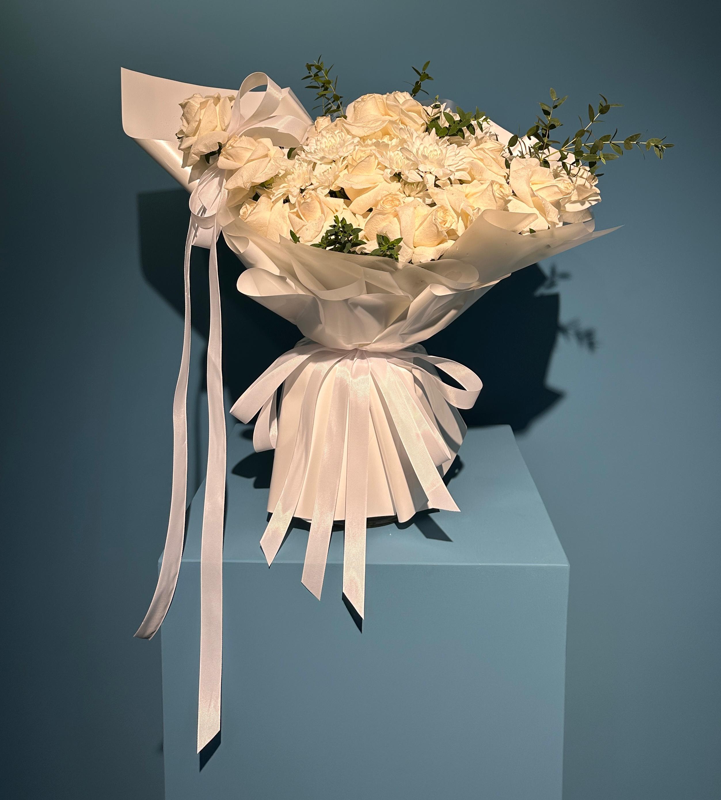 Porcelain white rose bouquet with chrysanthemums and eucalyptus