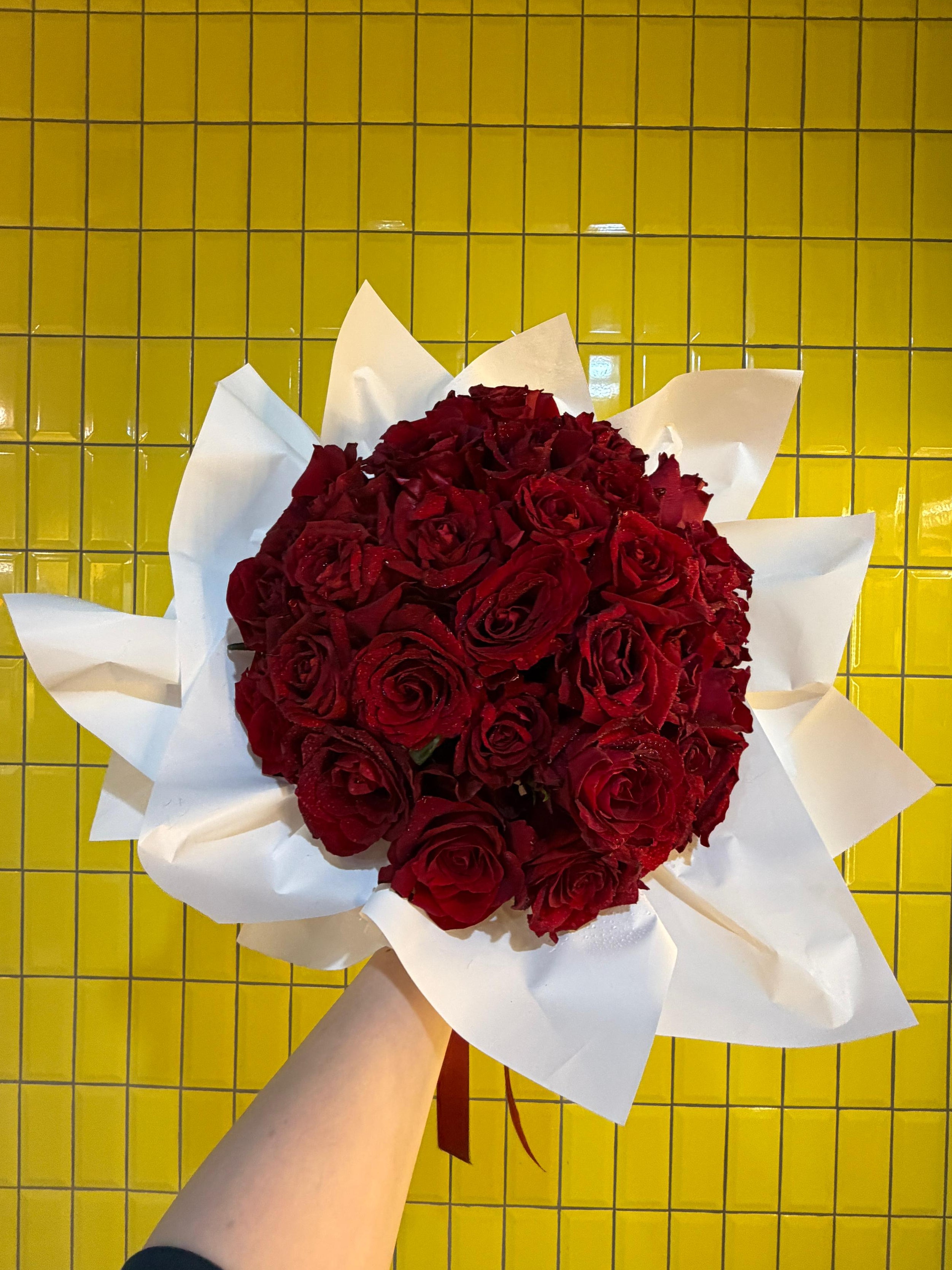 Vintage Love bouquet of 31 red roses wrapped in white paper